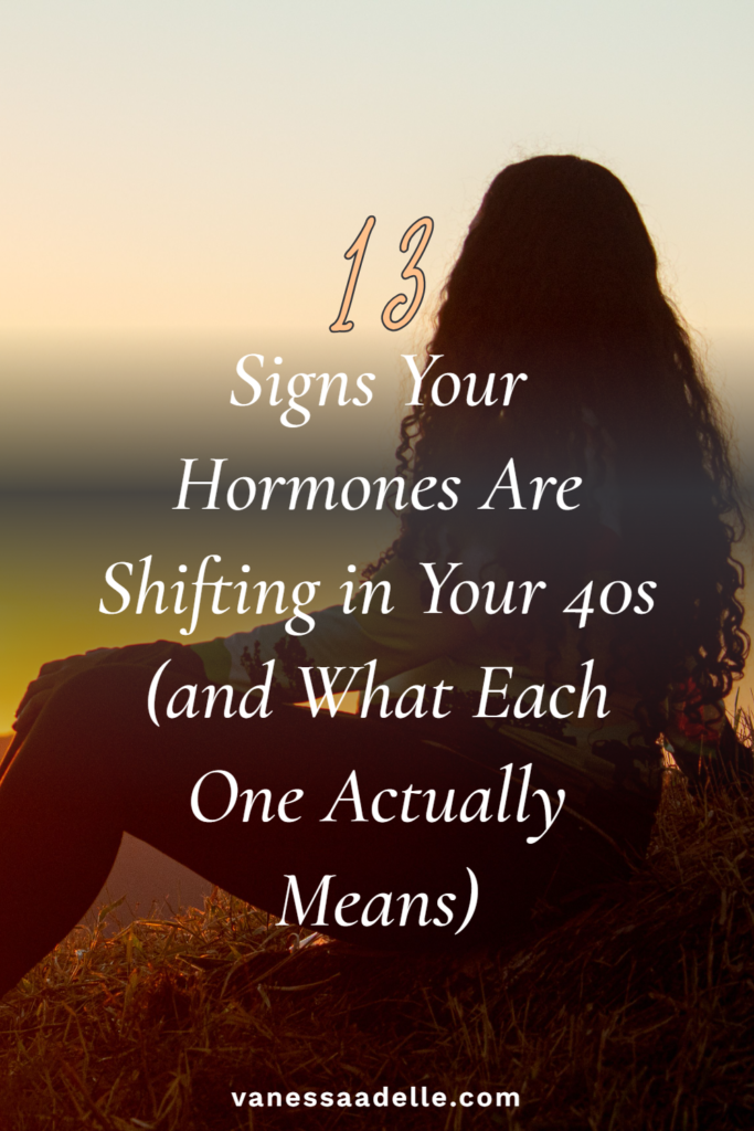 Image of woman looking at the sunset with the caption "13 signs your hormones are shifting in your 40s"